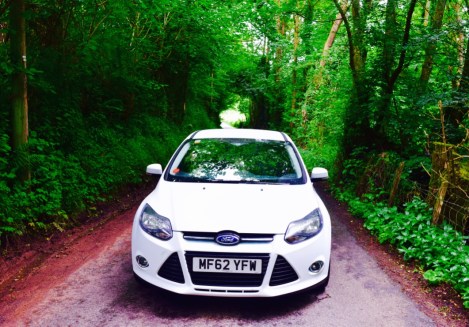 Road tripping around the lush forest of Wales in my brother car, Focus! I drive one of these back home but in blue!