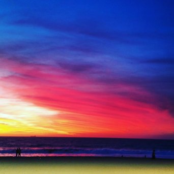A very colourful sun setting at Scarborough beach amphitheatre, during a night of dancing.